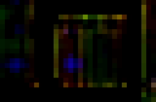 Background-subtracted crop of the compressed screenshot showing two smeared, fuzzy blue dots.